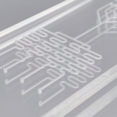 close up COC microfluidic glass background
